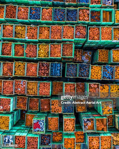 boxes of vehicle parts shot from directly above, le mans, france - retail abstract stock pictures, royalty-free photos & images