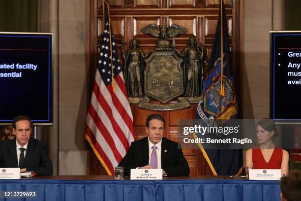 New York State Heath Commissioner Howard A. Zucker, M.D., J.D., New York Governor Andrew Cuomo, and Secretary to the Governor Melissa DeRosa attend...