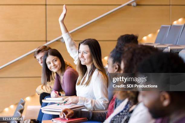 Student Rasing Their Hand 721 College Classroom Raising Hand Stock Photos, High-Res Pictures, and ...
