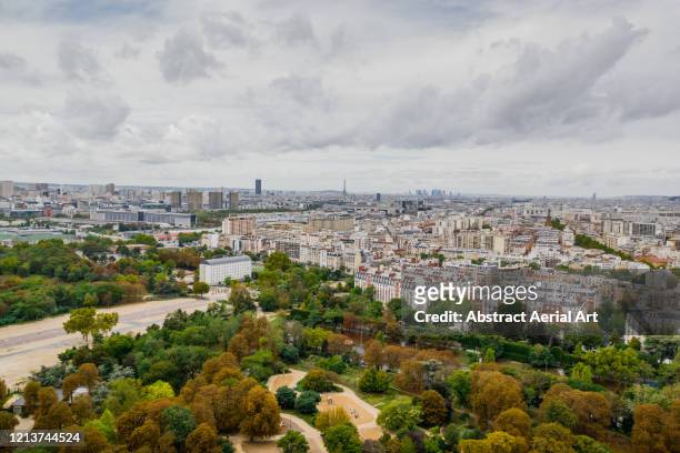 aerial view looking across paris, france - ile de france stock pictures, royalty-free photos & images