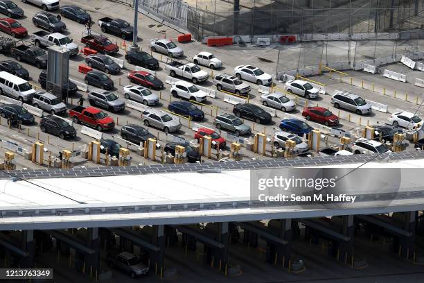 Motorists line up to cross into the United States from Mexico through the U.S. Customs and Border Protection - San Ysidro Port of Entry during the...