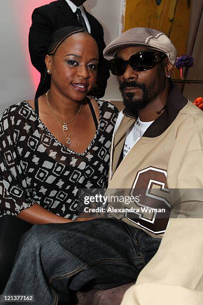 Shante Broadus and Snoop Dogg at "La La's Full Court Life" Premiere Party held at The Mark on August 18, 2011 in Los Angeles, California.