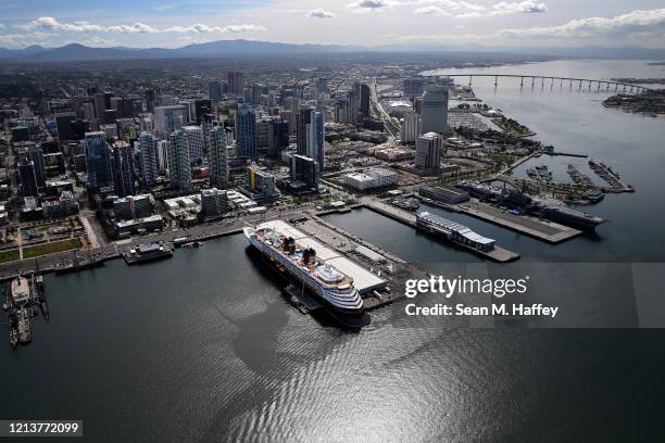 Aerial view of the Disney Wonder cruise ship docked at B Street Pier on March 20, 2020 in San Diego, California. In order to minimize passenger and...