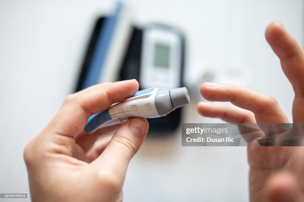 Blood Sugar Testing High-Res Stock Photo - Getty Images