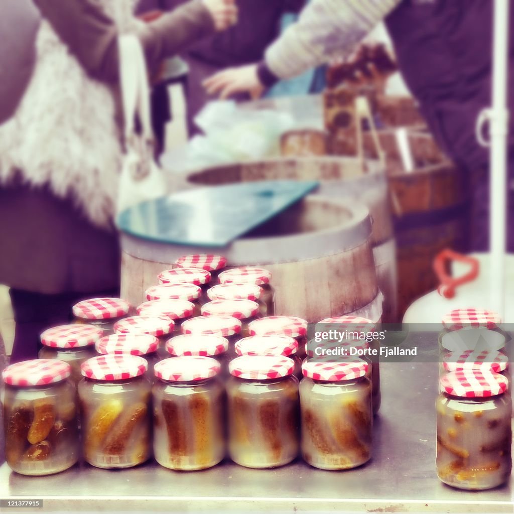 Pickled cucumbers in glass jars