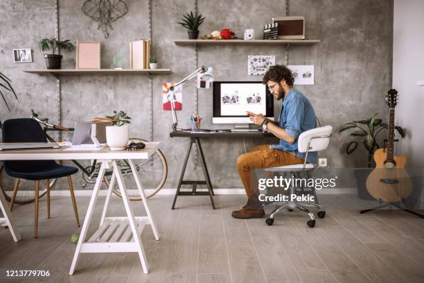 quick break to text some messages - home office chair stock pictures, royalty-free photos & images