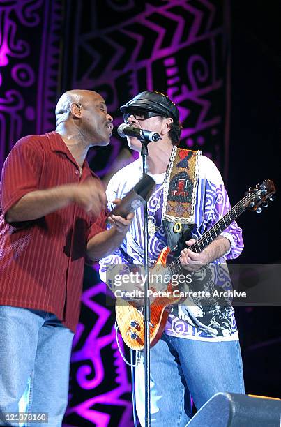 Tony Lindsay and Carlos Santana performing on stage during his 'Shaman' concert tour at Centennial Park on March 27, 2003 in Sydney, Australia.