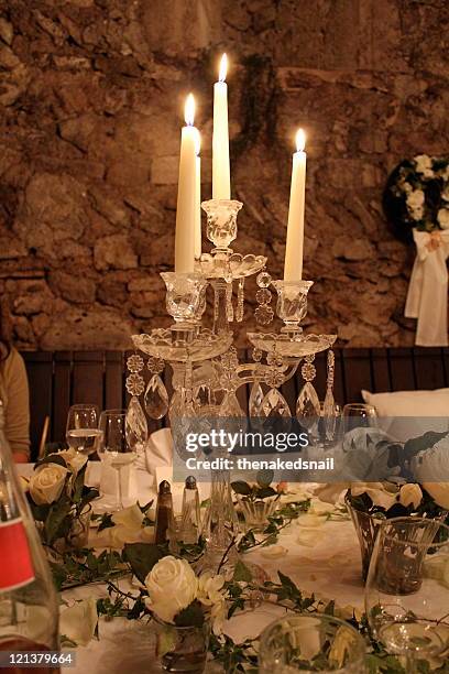 candle lit on table - gumpoldskirchen stock pictures, royalty-free photos & images