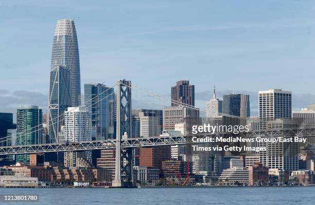 The Bay Bridge and the San Francisco skyline including the Salesforce Tower are seen in this view from the bay on Monday, March 9, 2020.