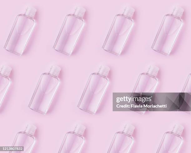 hand sanitizer or soap bottles - soap dispenser stock pictures, royalty-free photos & images