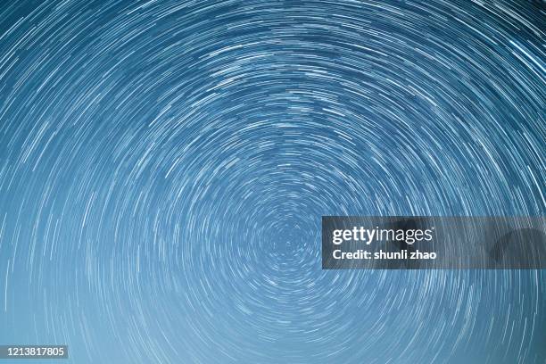 star trails - north star background stock pictures, royalty-free photos & images