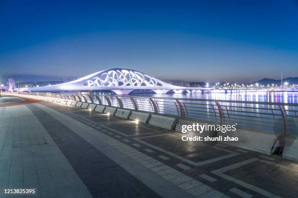 modern bridge structure - qingdao bridge stock pictures, royalty-free photos & images