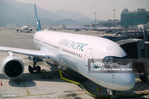 An airplane of Cathay Pacific Airways Limited stands at Hong Kong International Airport on November 15, 2019 in Hong Kong, China.