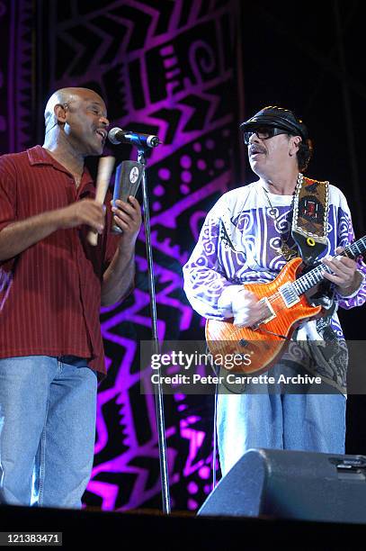 Tony Lindsay and Carlos Santana performing on stage during his 'Shaman' concert tour at Centennial Park on March 27, 2003 in Sydney, Australia.