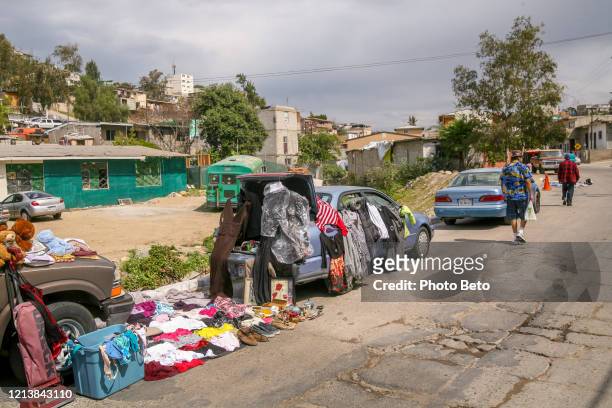 some vendors on a street in the lomas taurinas district near the us-mexico border at tijuana - mexico slums stock pictures, royalty-free photos & images
