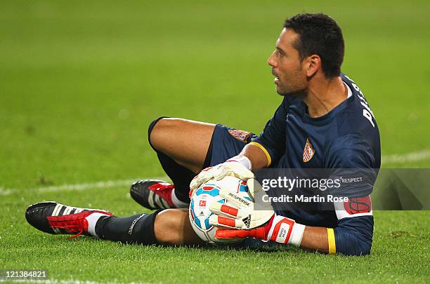 Andres Palop, goalkeeper of Sevilla saves the ball during the UEFA Europa League play-off match between Hannover 96 FC Sevilla at AWD Arena on August...