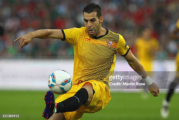 Alvaro Sanchez Negredo of Sevilla runs with the ball during the UEFA Europa League play-off match between Hannover 96 FC Sevilla at AWD Arena on...