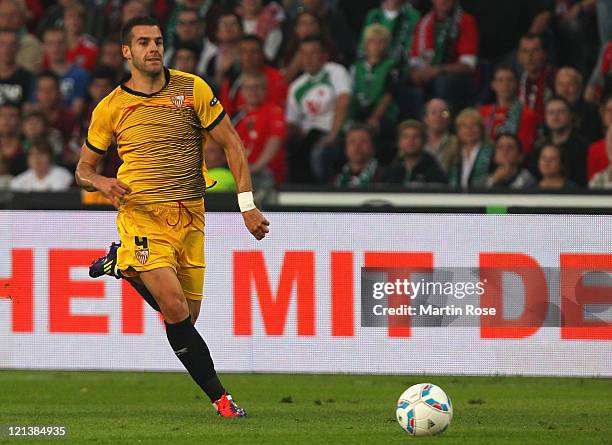 Alvaro Sanchez Negredo of Sevilla runs with the ball during the UEFA Europa League play-off match between Hannover 96 FC Sevilla at AWD Arena on...