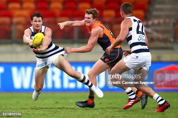 Patrick Dangerfield of the Cats makes a break during the round 1 AFL match between the Greater Western Sydney Giants and the Geelong Cats at GIANTS...