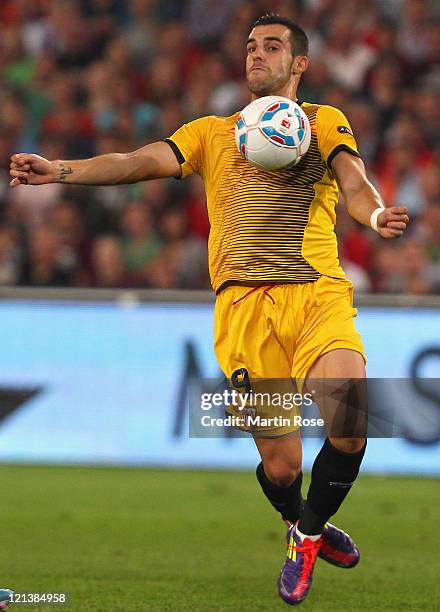 Alvaro Sanchez Negredo of Sevilla runs with the ball during the UEFA Europa League play-off match between Hannover 96 FC Sevilla at AWD Arena on...