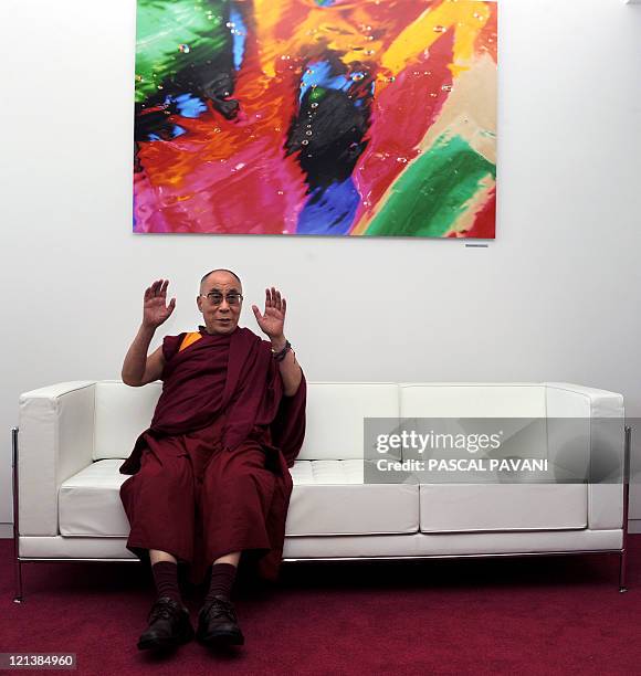 The Dalai Lama, the Tibet's exiled spiritual leader, sits in a sofa in the reception room of the airport of Blagnac, near the French southwestern...