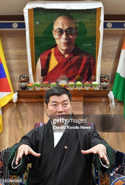 Photo taken on Jan. 17 shows Tibetan government-in-exile Prime Minister Lobsang Sangay giving an interview in Dharamsala, northern India. Seen in the...