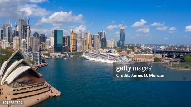 An aerial image of Carnival Cruise Line cruise ship Carnival Spirit at the Overseas Passenger Terminal in Circular Quay on March 21, 2020 in Sydney,...