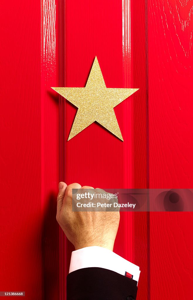 Stage manager knocking on star's door