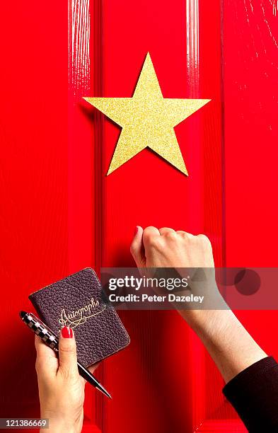 fan knocking on star's dressing room door - knocking stock pictures, royalty-free photos & images