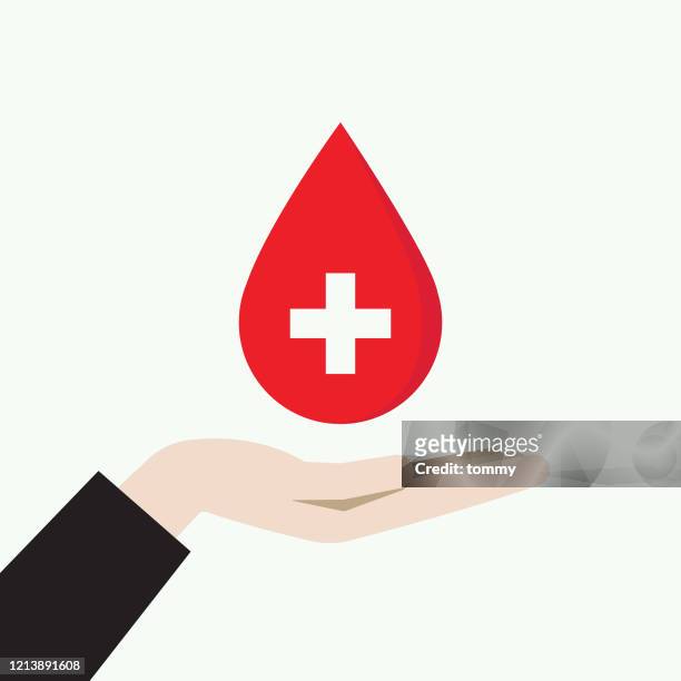 illustrazioni stock, clip art, cartoni animati e icone di tendenza di mano con in mano un simbolo di donazione di sangue - donazione