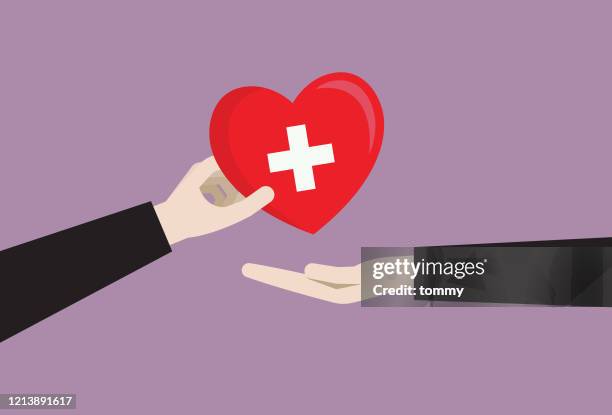 geschäftsmann gibt blutspendesymbol - organspende stock-grafiken, -clipart, -cartoons und -symbole