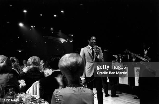 Sam Cooke , singer, songwriter and civil-rights activist, on stage with band at New York's Copacabana nightclub, June 1964.