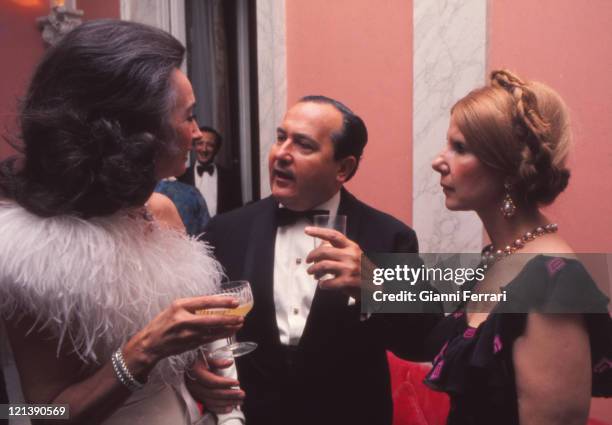 The Duchess Cayetana of Alba with the Minister Alfredo Sanchez Bella and the Countess of Quintanilla at a reception Madrid, Spain.