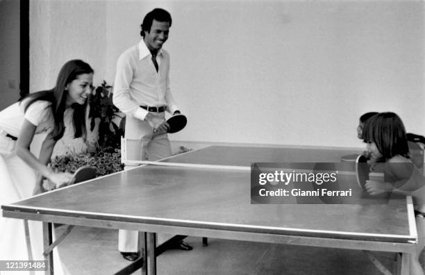 Julio Iglesias and his wife Isabel Preysler with their childrens Chabeli and Julio Jose, during a holiday in Marbella 10th July 1976, Malaga, Spain.