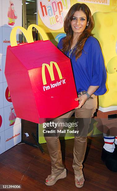 Bollywood actress Raveena Tandon during the launch of 'Nickelodeon-Mcdonalds Happy meal' in Mumbai on August 17, 2011.