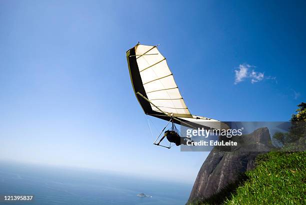 hang-gliding - leap of faith activity stock pictures, royalty-free photos & images