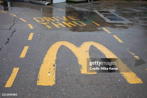 Drive through McDonalds on The Highway on 24th February 2020 in London, United Kingdom. A drive-through or drive-thru is a type of take-out service...