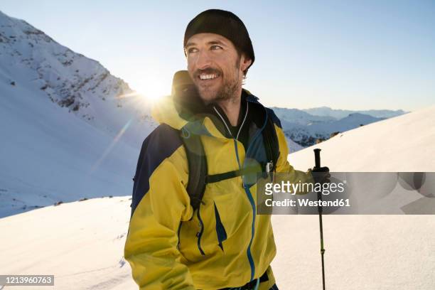 portrait of man during ski tour, lenzerheide, grisons, switzerland - winter sport stock-fotos und bilder