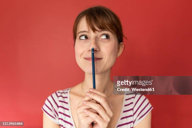 portrait of smiling woman with - contemplation stock pictures, royalty-free photos & images