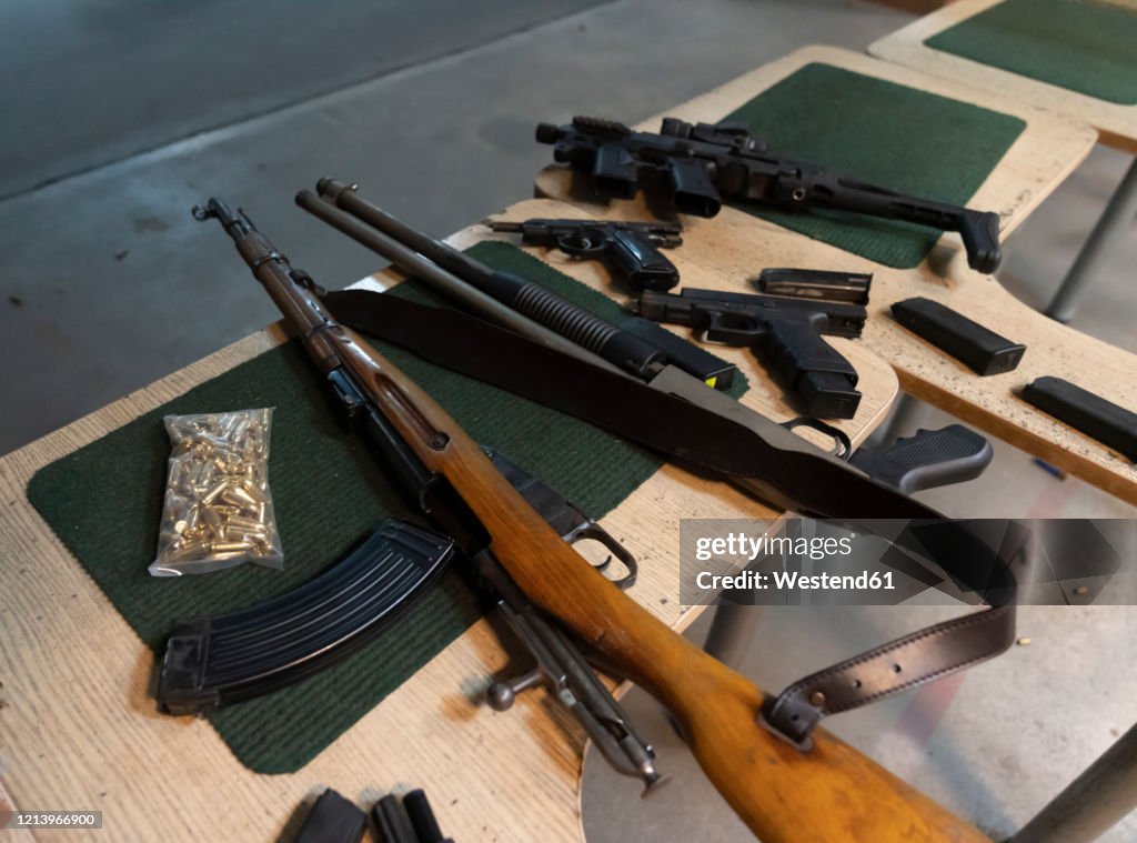 Guns on the table in shooting range