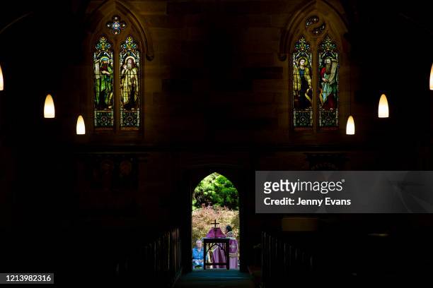 General view of the interior of St Paul's Anglican Church in Burwood is seen with members of the congregation seated outside on March 22, 2020 in...