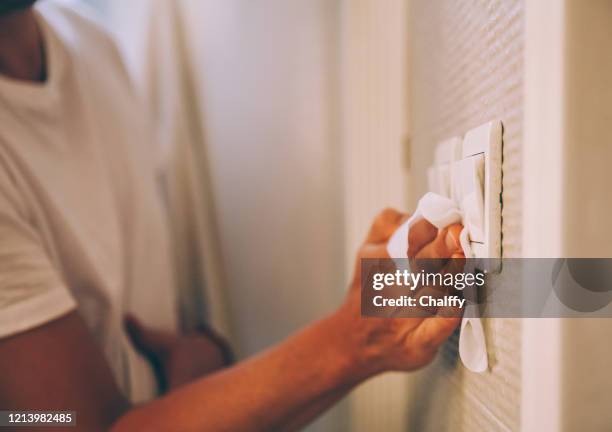 my light switch needs a good clean - disinfecting wipes stock pictures, royalty-free photos & images