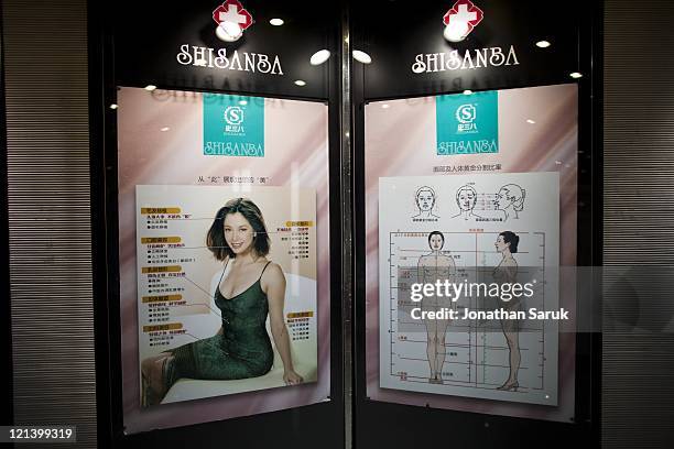 Informational posters inside the Shisanba Cosmetic Surgery Hospital May 12, 2011 in Beijing, China. Cosmetic surgery is on the rise in China as more...