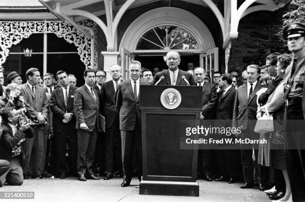At the Glassboro Summit Conference, American President Lyndon Baines Johnson speaks from a lectern; with him is Soviet Premier Alexey Kosygin ,...