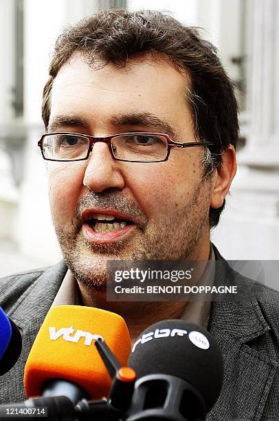 Belgium ecologist party Groen! chairman Wouter Van Besien talks to journalists as he arrives for a meeting with French-speaking Socialist leader and...