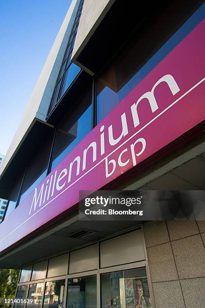 The logo of Millenium BCP Investimento, owned by Banco Comercial Portugues SA, sits outside the headquarters in Lisbon, Portugal, on Friday, Aug. 19,...