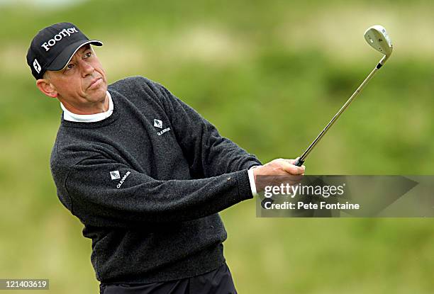 Bob Cameron watches his approach shot into the green during the third round of the Senior British Open at the Royal Portrush Golf Club, July 24, 2004