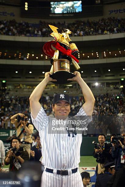 Hideki Matsui of the New York Yankees. Holds up the MVP Trophy.The New York Yankees defeat the Tampa Bay Devil Rays 12-1 at the Tokyo Dome in Tokyo,...