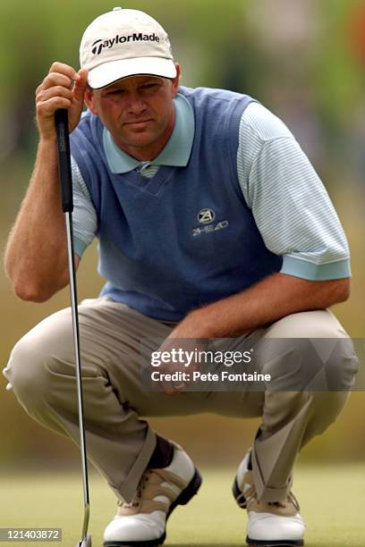 Retief Goosen reads a putt during the final round of the Smurfit European Open on the K-Club Smurfit course. July 4, 2004