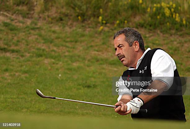 Sam Torrance chips to the green during the second round of the Senior British Open at the Royal Portrush Golf Club, July 23, 2004.